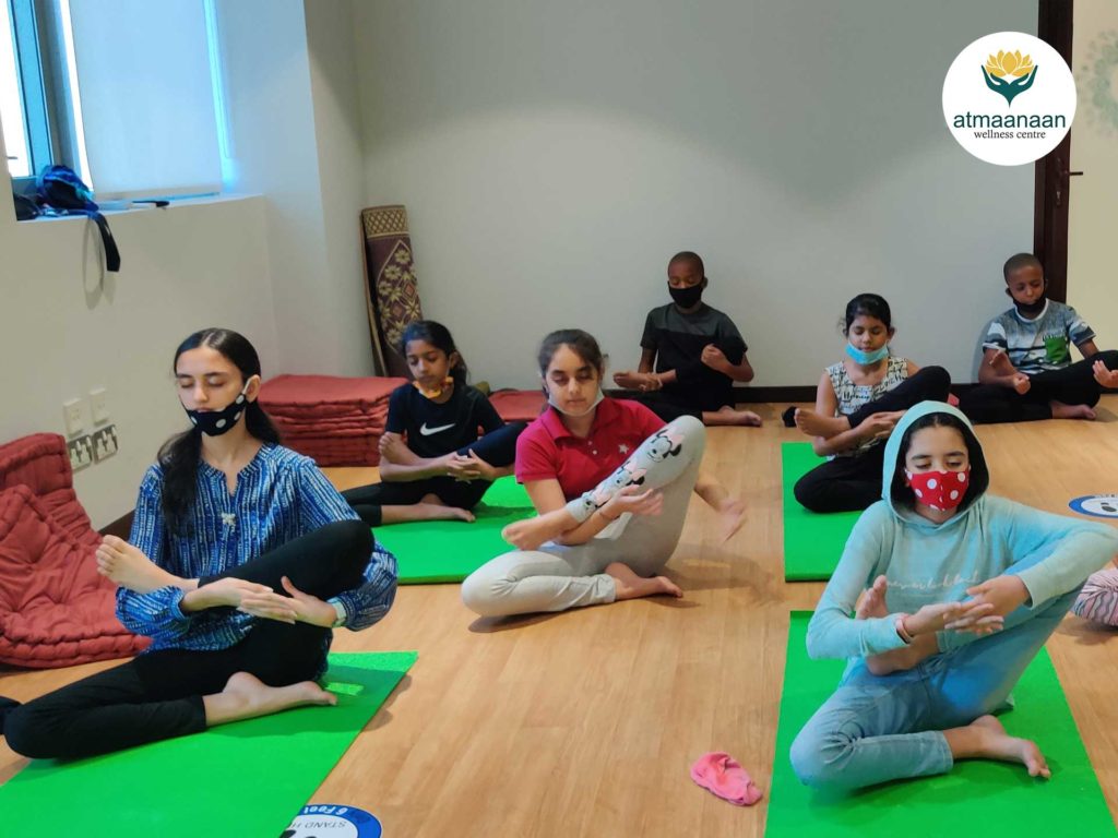 Children doing yoga at Atmaanaan Wellness Centre, Dubai