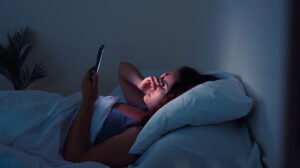 Woman sleeping peacefully after practicing CBT-I and relaxation techniques for insomnia relief.